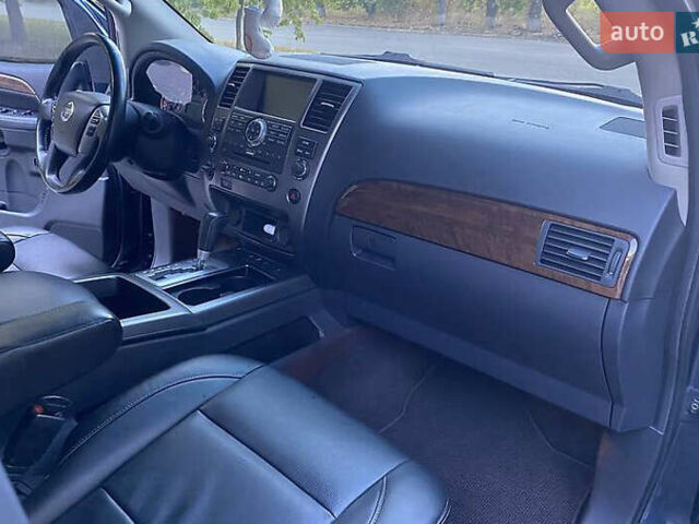 Синій Ніссан Armada, об'ємом двигуна 5.55 л та пробігом 126 тис. км за 15000 $, фото 10 на Automoto.ua