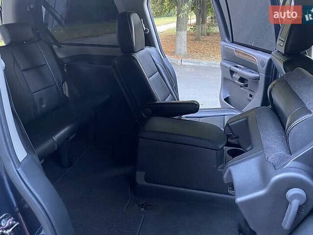 Синій Ніссан Armada, об'ємом двигуна 5.55 л та пробігом 126 тис. км за 15000 $, фото 16 на Automoto.ua