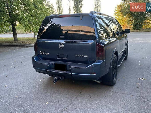 Синій Ніссан Armada, об'ємом двигуна 5.55 л та пробігом 126 тис. км за 15000 $, фото 4 на Automoto.ua