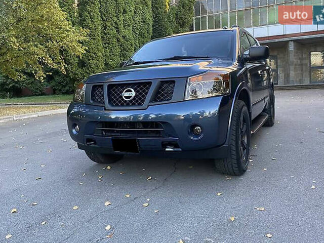 Синій Ніссан Armada, об'ємом двигуна 5.55 л та пробігом 126 тис. км за 15000 $, фото 5 на Automoto.ua