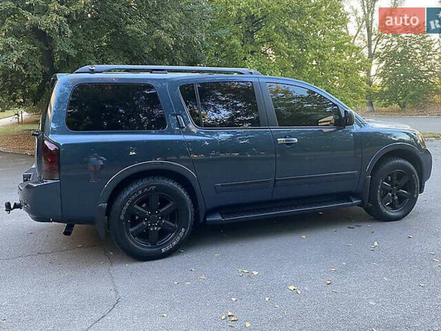 Синій Ніссан Armada, об'ємом двигуна 5.55 л та пробігом 126 тис. км за 15000 $, фото 2 на Automoto.ua