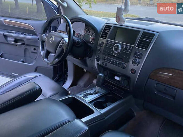 Синій Ніссан Armada, об'ємом двигуна 5.55 л та пробігом 126 тис. км за 15000 $, фото 7 на Automoto.ua