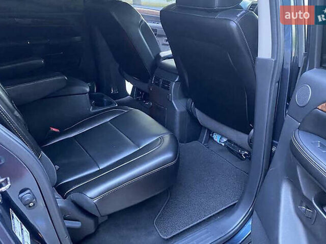 Синій Ніссан Armada, об'ємом двигуна 5.55 л та пробігом 126 тис. км за 15000 $, фото 14 на Automoto.ua