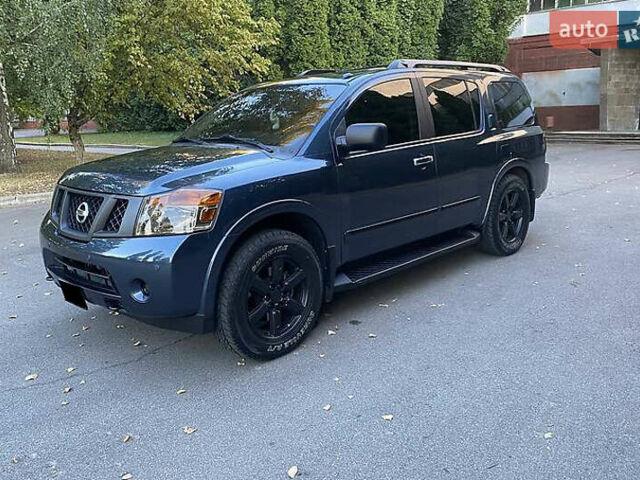Синій Ніссан Armada, об'ємом двигуна 5.55 л та пробігом 126 тис. км за 15000 $, фото 1 на Automoto.ua