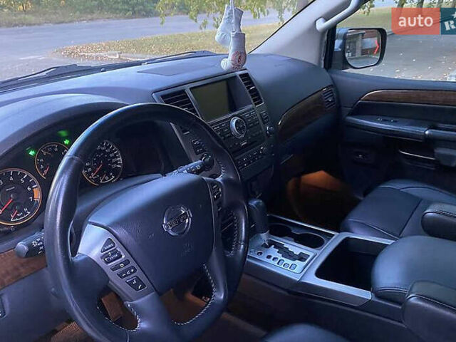 Синій Ніссан Armada, об'ємом двигуна 5.55 л та пробігом 126 тис. км за 15000 $, фото 6 на Automoto.ua