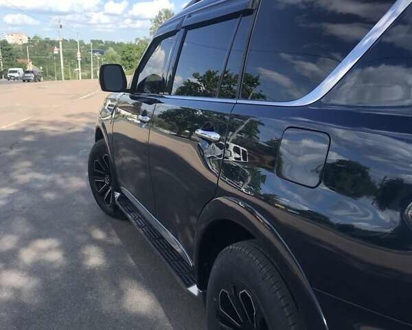 Синий Ниссан Армада, объемом двигателя 5.6 л и пробегом 77 тыс. км за 29900 $, фото 6 на Automoto.ua