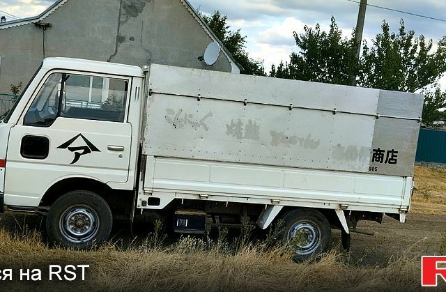 Белый Ниссан Атлас, объемом двигателя 2.3 л и пробегом 146 тыс. км за 3600 $, фото 6 на Automoto.ua