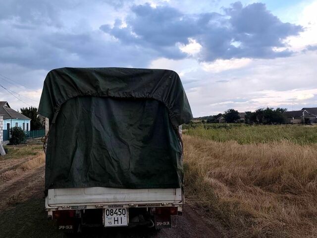 Белый Ниссан Атлас, объемом двигателя 2.3 л и пробегом 146 тыс. км за 3600 $, фото 2 на Automoto.ua