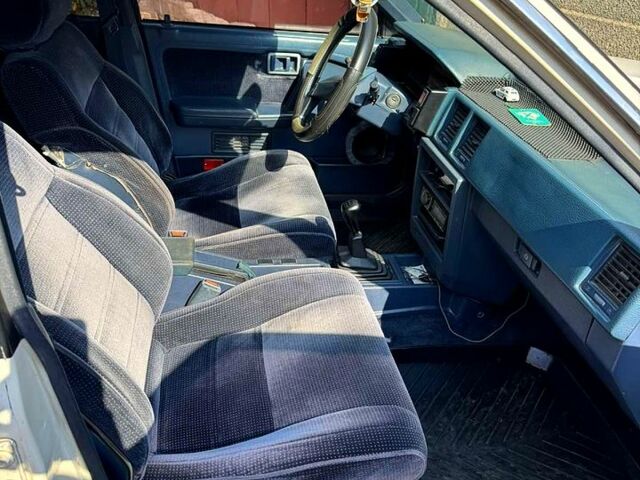 Белый Ниссан Блюберд, объемом двигателя 2 л и пробегом 230 тыс. км за 1800 $, фото 8 на Automoto.ua