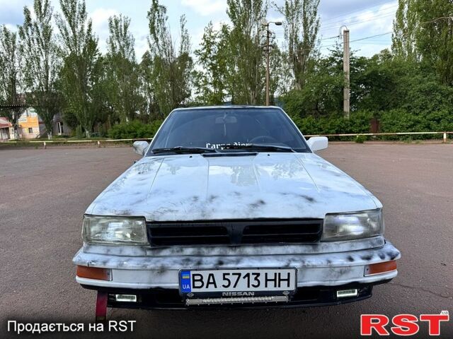 Белый Ниссан Блюберд, объемом двигателя 2 л и пробегом 200 тыс. км за 1050 $, фото 7 на Automoto.ua