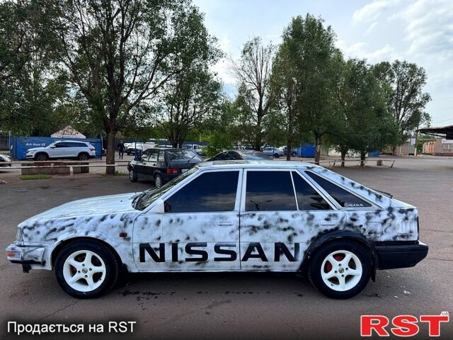 Белый Ниссан Блюберд, объемом двигателя 2 л и пробегом 200 тыс. км за 1050 $, фото 3 на Automoto.ua