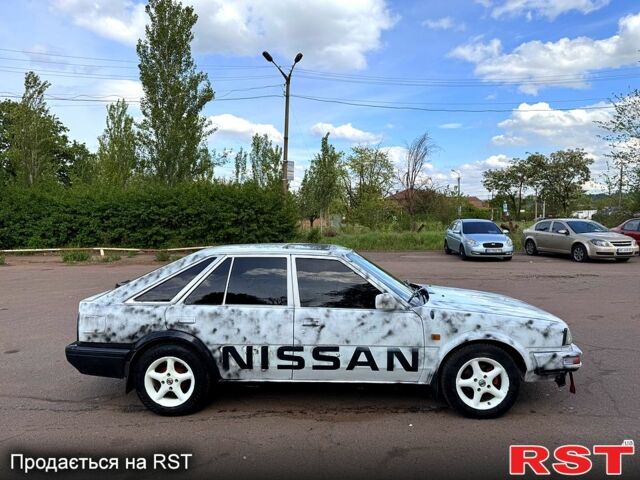 Белый Ниссан Блюберд, объемом двигателя 2 л и пробегом 200 тыс. км за 1050 $, фото 2 на Automoto.ua