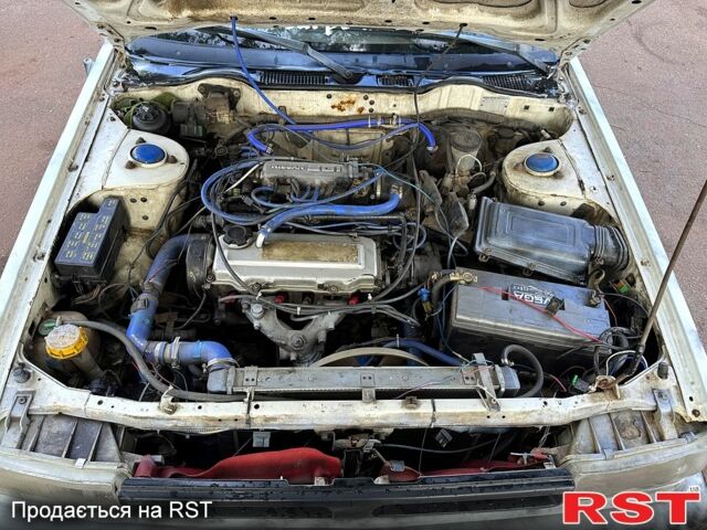 Белый Ниссан Блюберд, объемом двигателя 2 л и пробегом 200 тыс. км за 1050 $, фото 13 на Automoto.ua