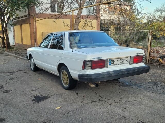 Белый Ниссан Блюберд, объемом двигателя 2 л и пробегом 300 тыс. км за 650 $, фото 1 на Automoto.ua