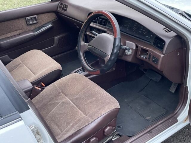 Белый Ниссан Блюберд, объемом двигателя 1.6 л и пробегом 320 тыс. км за 600 $, фото 7 на Automoto.ua