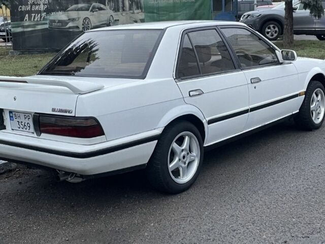 Белый Ниссан Блюберд, объемом двигателя 1.6 л и пробегом 320 тыс. км за 600 $, фото 3 на Automoto.ua