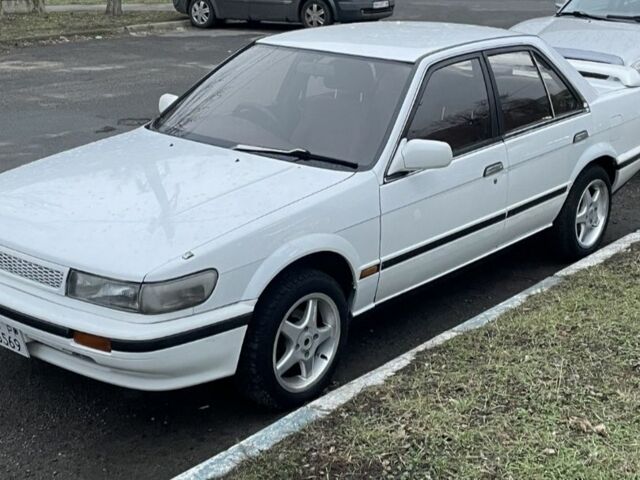 Белый Ниссан Блюберд, объемом двигателя 1.6 л и пробегом 320 тыс. км за 600 $, фото 1 на Automoto.ua