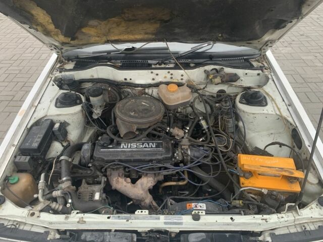 Белый Ниссан Блюберд, объемом двигателя 1.8 л и пробегом 184 тыс. км за 1800 $, фото 5 на Automoto.ua