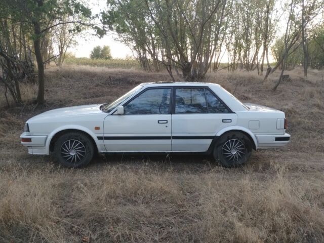 Белый Ниссан Блюберд, объемом двигателя 2 л и пробегом 387 тыс. км за 1200 $, фото 2 на Automoto.ua