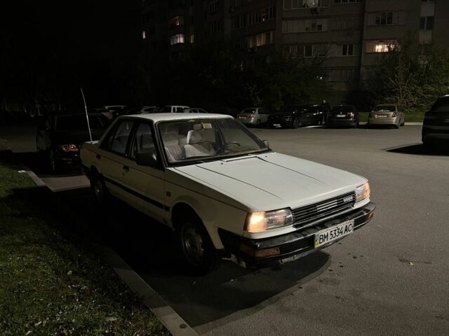 Белый Ниссан Блюберд, объемом двигателя 2 л и пробегом 300 тыс. км за 691 $, фото 1 на Automoto.ua