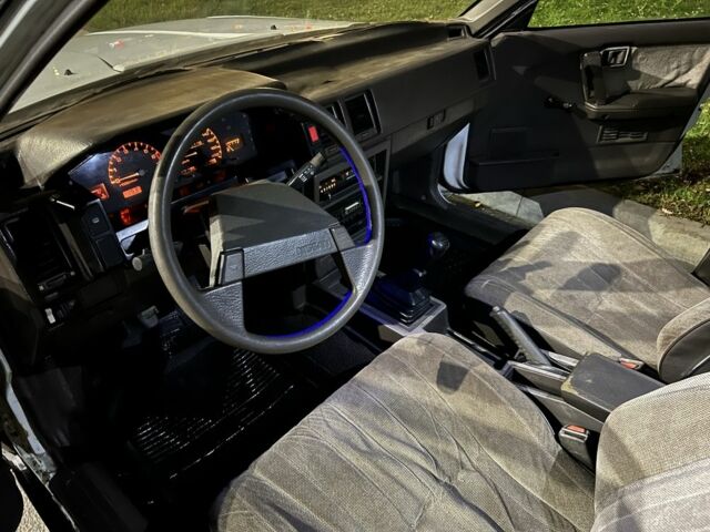 Белый Ниссан Блюберд, объемом двигателя 2 л и пробегом 300 тыс. км за 691 $, фото 6 на Automoto.ua