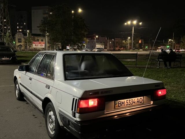 Белый Ниссан Блюберд, объемом двигателя 2 л и пробегом 300 тыс. км за 691 $, фото 2 на Automoto.ua