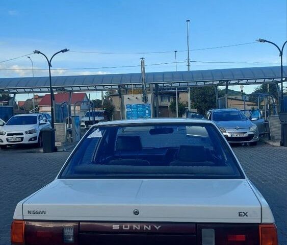 Белый Ниссан Блюберд, объемом двигателя 1.3 л и пробегом 135 тыс. км за 650 $, фото 2 на Automoto.ua