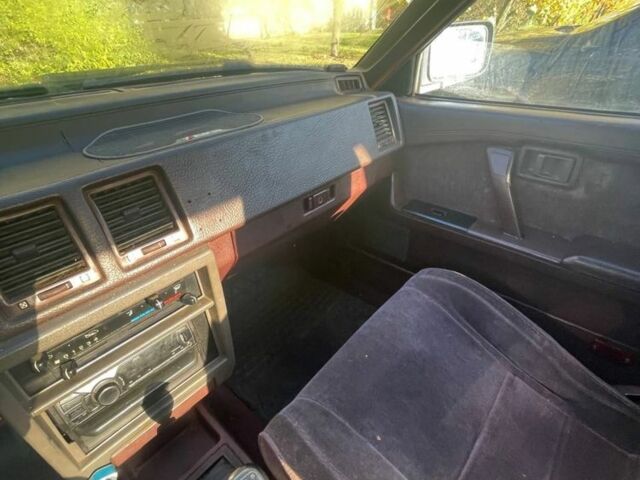 Коричневый Ниссан Блюберд, объемом двигателя 2 л и пробегом 341 тыс. км за 750 $, фото 2 на Automoto.ua