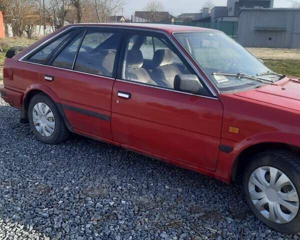 Червоний Ніссан Блюберд, об'ємом двигуна 2 л та пробігом 315 тис. км за 1450 $, фото 9 на Automoto.ua