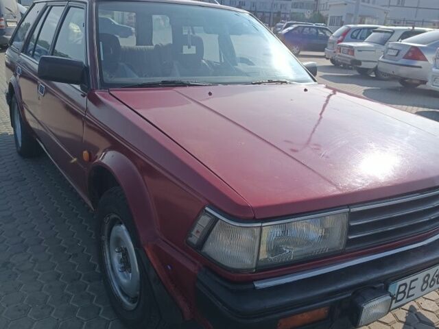 Красный Ниссан Блюберд, объемом двигателя 2 л и пробегом 65 тыс. км за 1700 $, фото 1 на Automoto.ua