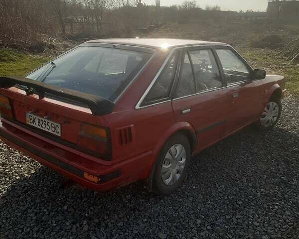 Червоний Ніссан Блюберд, об'ємом двигуна 2 л та пробігом 315 тис. км за 1450 $, фото 10 на Automoto.ua