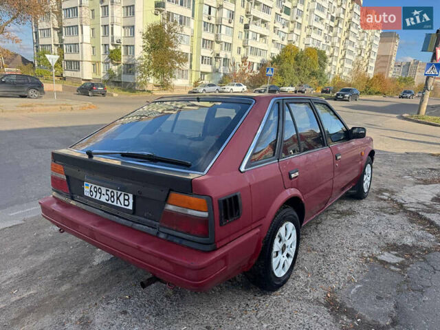 Красный Ниссан Блюберд, объемом двигателя 2 л и пробегом 300 тыс. км за 550 $, фото 3 на Automoto.ua