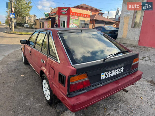 Красный Ниссан Блюберд, объемом двигателя 2 л и пробегом 300 тыс. км за 550 $, фото 4 на Automoto.ua