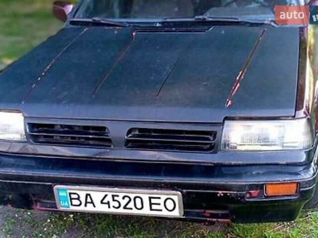 Красный Ниссан Блюберд, объемом двигателя 1.97 л и пробегом 400 тыс. км за 700 $, фото 3 на Automoto.ua