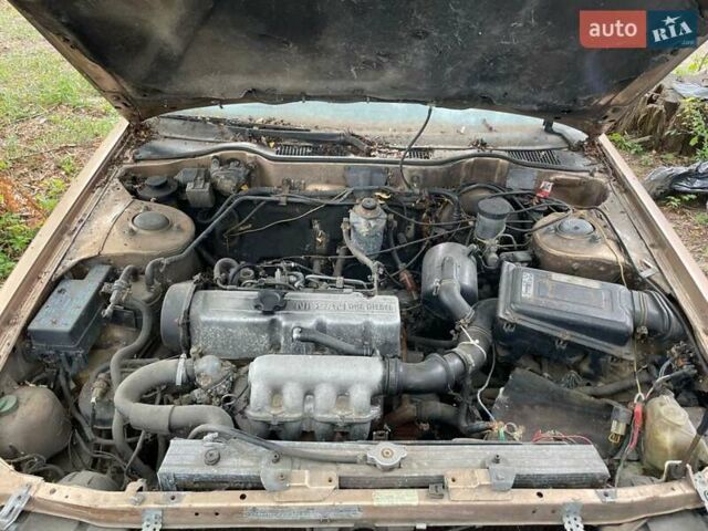 Желтый Ниссан Блюберд, объемом двигателя 2 л и пробегом 130 тыс. км за 900 $, фото 3 на Automoto.ua