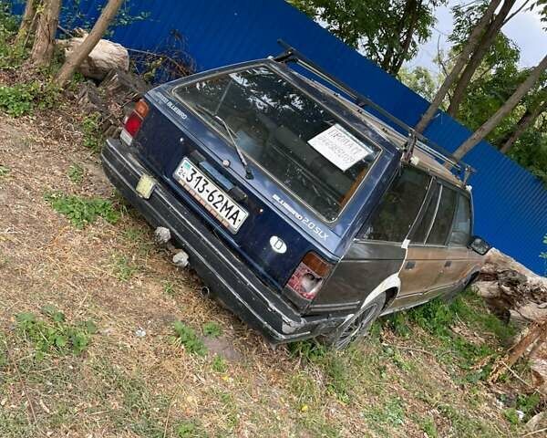 Желтый Ниссан Блюберд, объемом двигателя 2 л и пробегом 130 тыс. км за 900 $, фото 7 на Automoto.ua