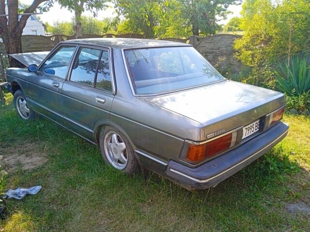 Серый Ниссан Блюберд, объемом двигателя 1.8 л и пробегом 160 тыс. км за 571 $, фото 1 на Automoto.ua