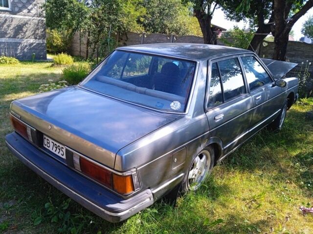 Серый Ниссан Блюберд, объемом двигателя 1.8 л и пробегом 160 тыс. км за 571 $, фото 2 на Automoto.ua