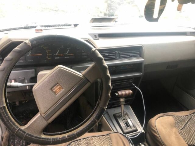 Серый Ниссан Блюберд, объемом двигателя 1.8 л и пробегом 75 тыс. км за 450 $, фото 4 на Automoto.ua