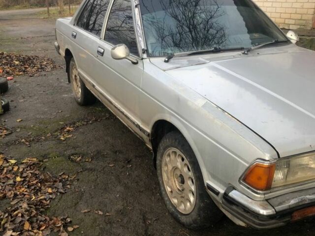 Серый Ниссан Блюберд, объемом двигателя 1.8 л и пробегом 75 тыс. км за 450 $, фото 2 на Automoto.ua