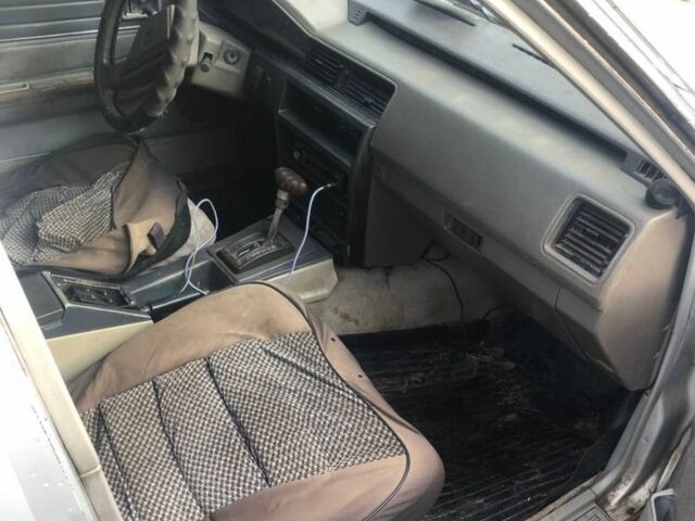 Серый Ниссан Блюберд, объемом двигателя 1.8 л и пробегом 75 тыс. км за 450 $, фото 5 на Automoto.ua