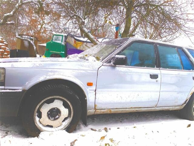 Серый Ниссан Блюберд, объемом двигателя 2 л и пробегом 450 тыс. км за 1100 $, фото 1 на Automoto.ua