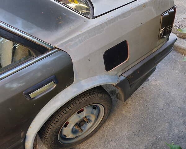 Серый Ниссан Блюберд, объемом двигателя 2 л и пробегом 300 тыс. км за 750 $, фото 7 на Automoto.ua