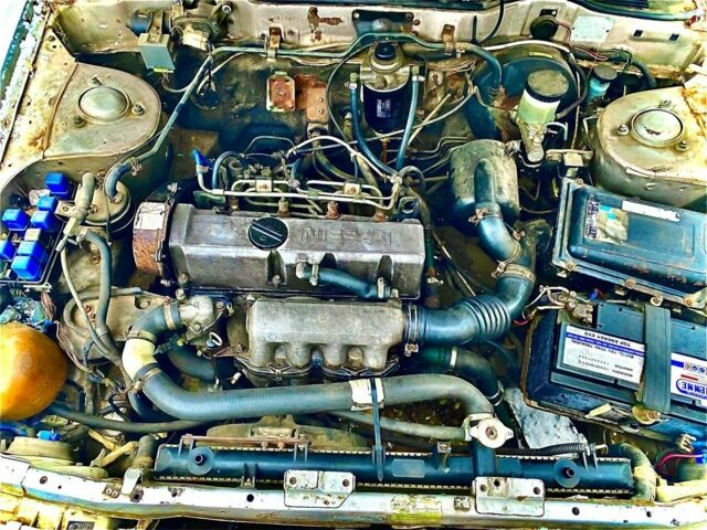 Серый Ниссан Блюберд, объемом двигателя 2 л и пробегом 450 тыс. км за 1100 $, фото 7 на Automoto.ua