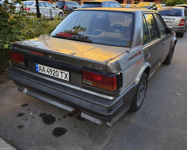 Серый Ниссан Блюберд, объемом двигателя 2 л и пробегом 300 тыс. км за 750 $, фото 3 на Automoto.ua