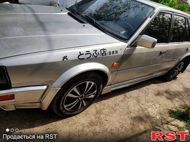 Серый Ниссан Блюберд, объемом двигателя 2 л и пробегом 250 тыс. км за 650 $, фото 8 на Automoto.ua