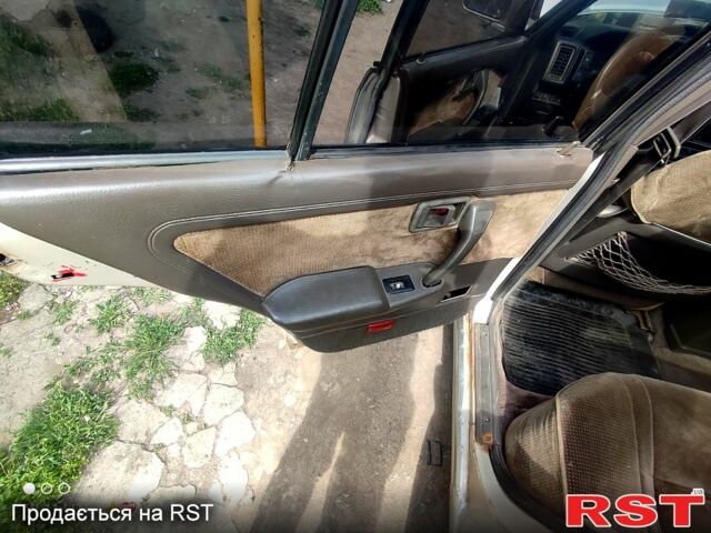 Серый Ниссан Блюберд, объемом двигателя 2 л и пробегом 250 тыс. км за 650 $, фото 2 на Automoto.ua