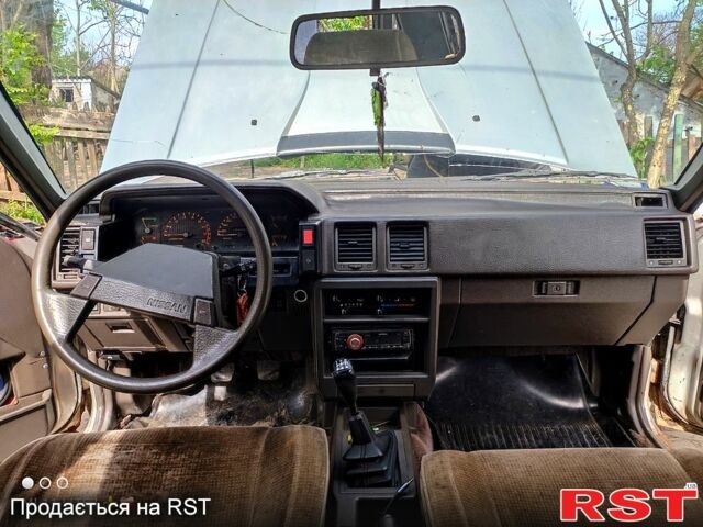 Серый Ниссан Блюберд, объемом двигателя 2 л и пробегом 250 тыс. км за 650 $, фото 3 на Automoto.ua