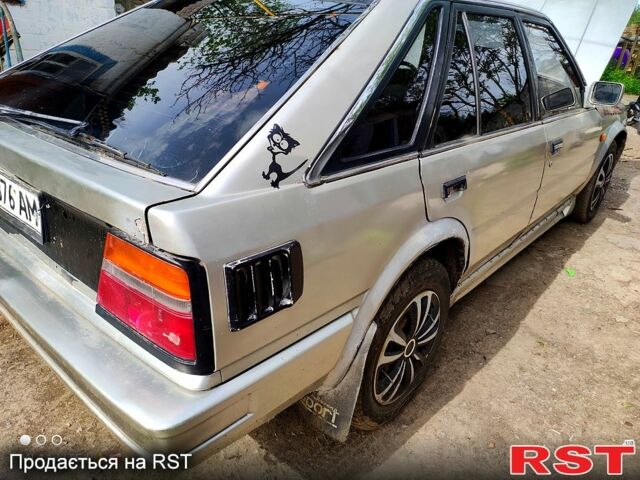 Серый Ниссан Блюберд, объемом двигателя 2 л и пробегом 250 тыс. км за 650 $, фото 6 на Automoto.ua