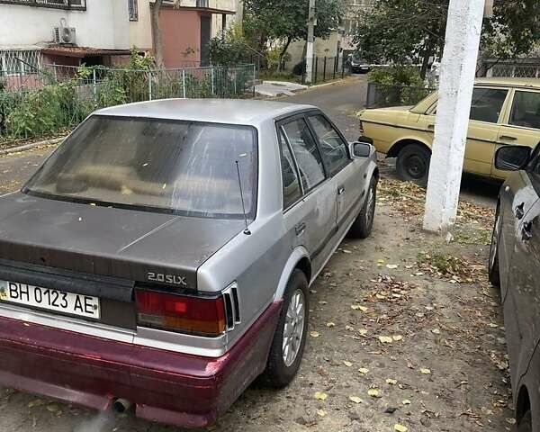 Серый Ниссан Блюберд, объемом двигателя 2 л и пробегом 250 тыс. км за 1600 $, фото 6 на Automoto.ua